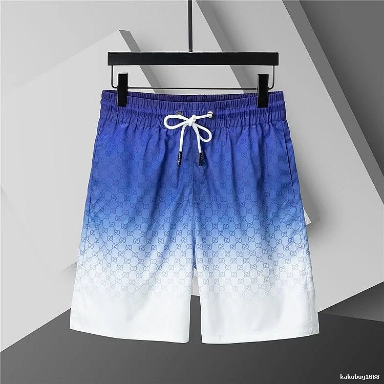 Gucci gradient-style blue and white shorts