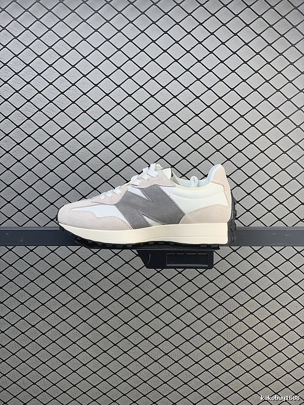 New Balance Gray Retro Runners Highlighting Road Runner Profile