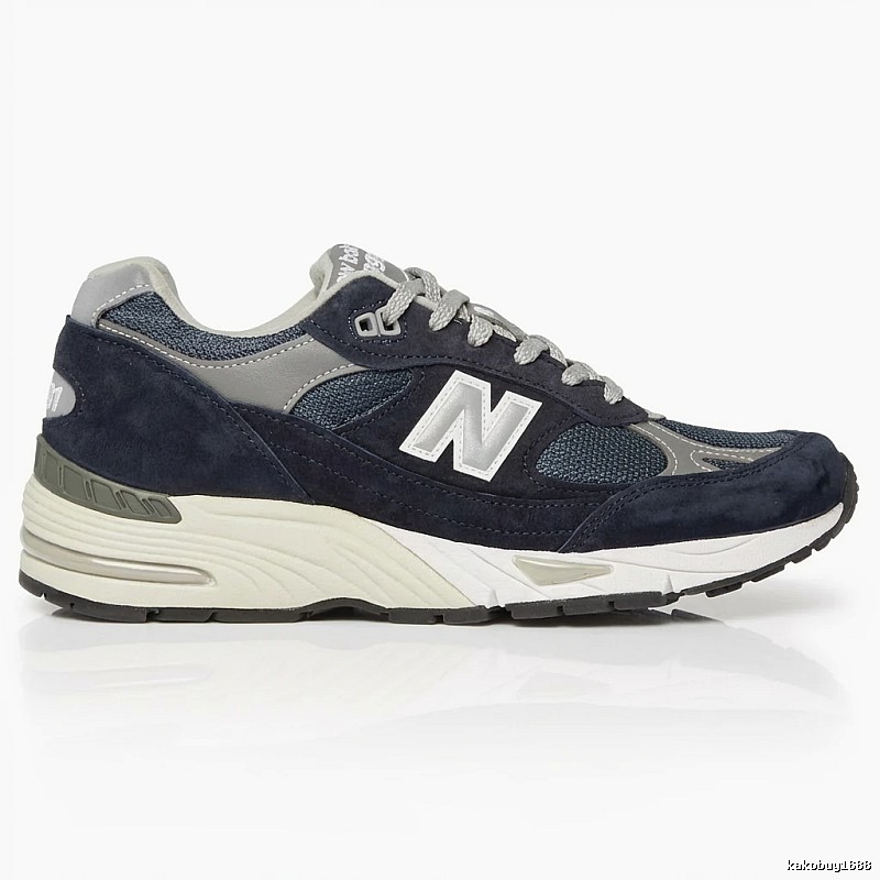 New Balance retro-style dark blue and grey sports shoes