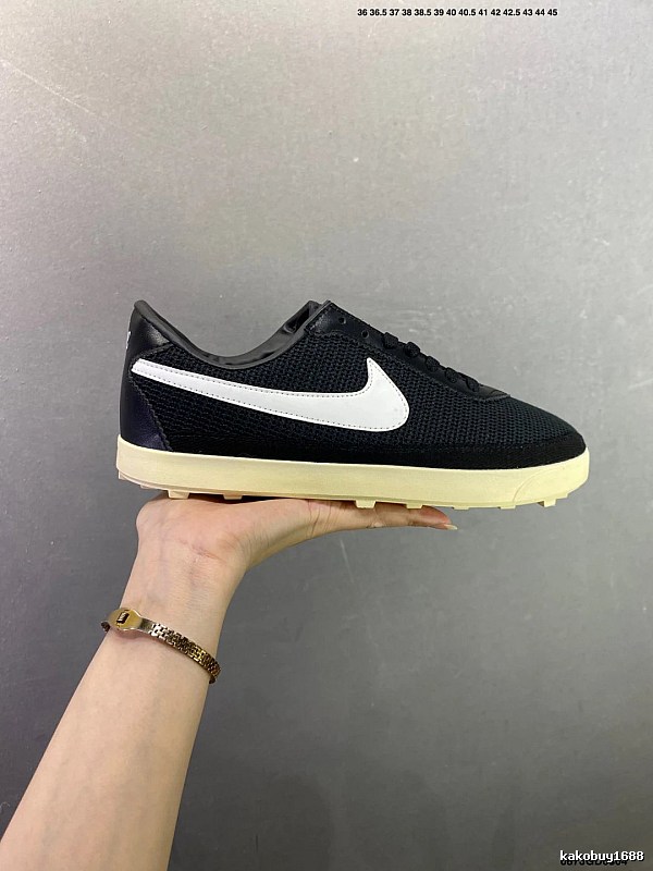 Nike Black and White Waffle-Sole Runners Highlighting Retro Heel Shape