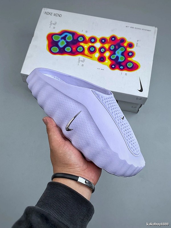 Nike Lavender Foam Mules and Layered Side Panels