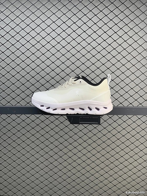 On Cloud Runners in White and Black, Finished with Layered Mesh Upper